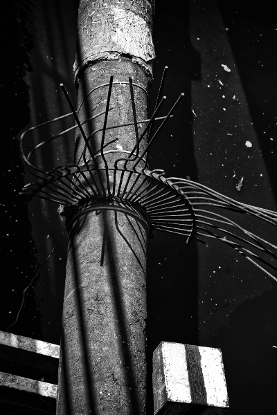 Bound post against dark sky