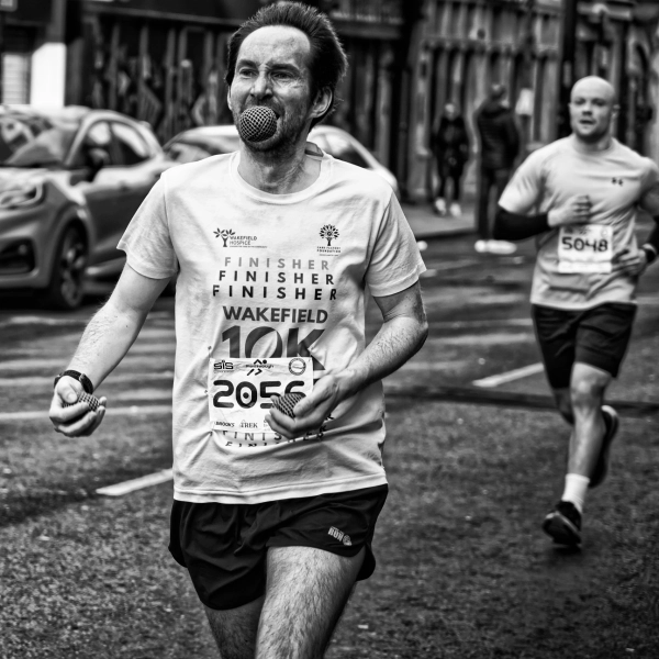 Runner in a finisher shirt