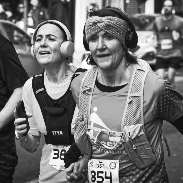 Two runners side by side