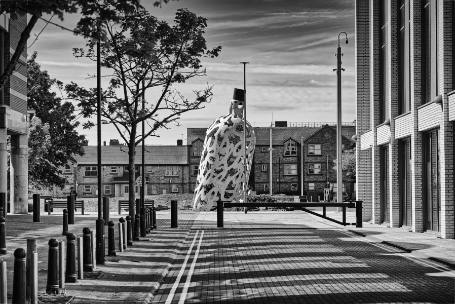 Empty street with sculpture