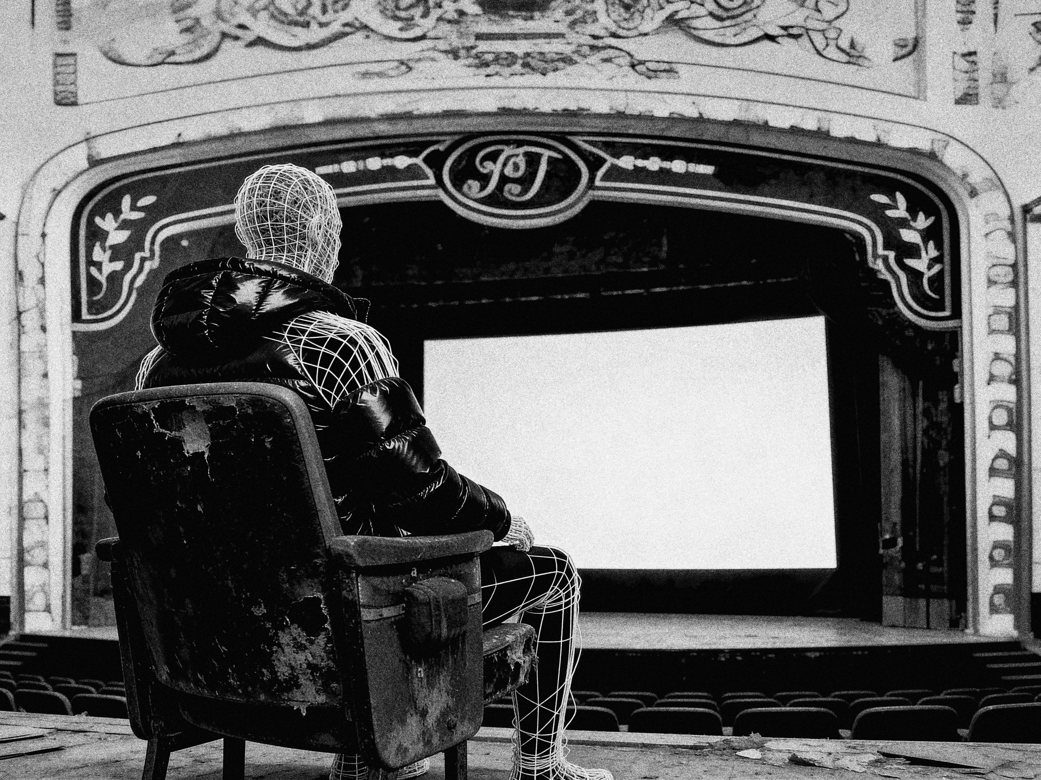 Seated wireframe in auditorium